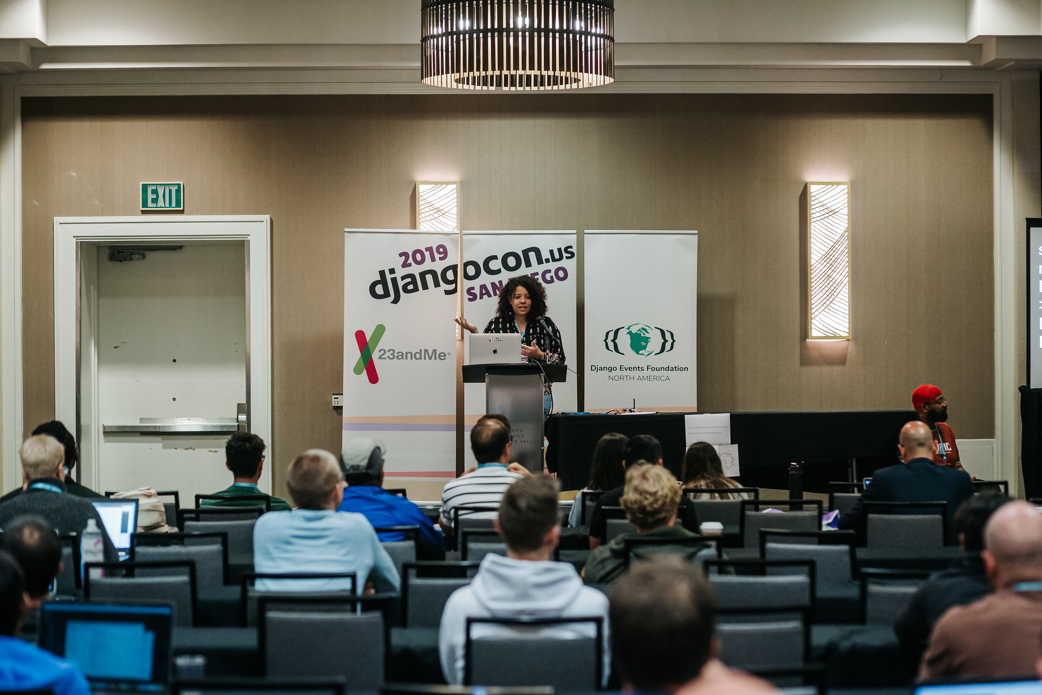 Speaker addressing a crowd at DjangoCon US 2019 in San Diego